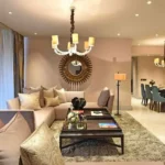 4 BHK Runwal Elegant Lokhandwala Andheri West Living Room with Sofas and Chandelior