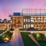 Narang Courtyard Building Exterior With Glass Facade And Garden