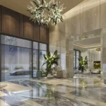Sugee Marina Bay Worli Lobby Area With Marble Flooring Sofa Seating Plants And Glass Entry Doors