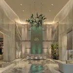 Sugee Marina Bay Worli Lobby Area With Marble Flooring Sofa Seating Plants And Glass Entry Doors