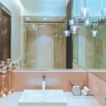 Raheja Imperia Worli Bathroom With Glass Shower And Sink Counter