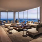 4 BHK Raheja Artesia Worli Living Room With Sofa Set And Glass Windows