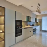 Modern Kitchen of 5 Bedroom Apartment Tridhaatu Aranya