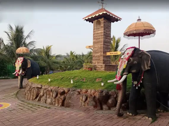 Kerala Village Shahapur entrance Flanked by Two Elephant Statues