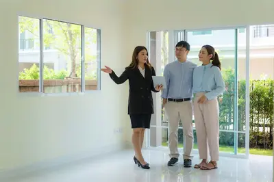Realtor Showing Home to Couple
