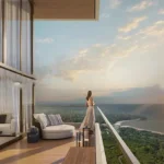 Lodha Alibaug Sea Facing Apartments Woman looking out of Balcony