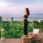 Godrej Skyshore Versova Woman admiring Sea View from Balcony