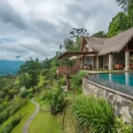 Istana Santai Nashik 3 BHK Villa Pool with Deck Hilly Background with Trees