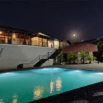 Kenisha Resort Villas Jambhulpada Khopoli Clubhouse Pool View at Night