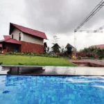 Kenisha Resort Villas Jambhulpada Khopoli Swimming Pool with 2 BHK Villa Background