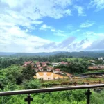 Kenisha Resort Villas Jambhulpada Khopoli Wide angle View of Villa Groupings in Distance Blue Sky