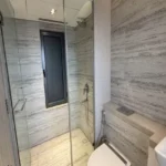 4 BHK Rustomjee Paramount Khar Shower Area Bathroom