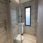 4 BHK Rustomjee Paramount Khar Shower Partition Bathroom