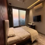 6 BHK Jodi Flat Oberoi Esquire Goregaon Wood Panel Bedroom
