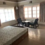 4 BHK Beachfront Villa Kashid Beach Alibaug Bedroom with Lounge Chairs