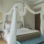 4 BHK Gulmohar Villa Avas Living Alibaug Four Poster Bed in Master Bedroom