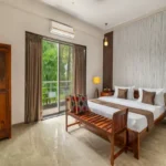 5 BHK Villa Khatri Park Lonavala Herringbone Floor Wall TV Bedroom