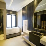 K Raheja Antares JVLR LBS Road 3 BHK Freestanding Tub Gold Fixture Bathroom