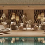 Lodha Group Lodha Bellevue Mahalaxmi Poolside Seating Area With Lounge Chairs