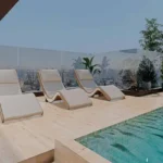 Paradigm Superstar Bandra West Glass Railing Recliner Chairs Sundeck