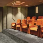 Runwal Sanctuary Mulund West Mini Theatre With Premium Orange Recliners