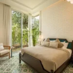 La Sierra Vagator Villa 3 BHK Bedroom With Double Bed And Corner Windows