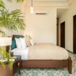 La Sierra Vagator Villa 3 BHK Bedroom With Double Bed And Side Table