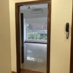 3.5 BHK Windermere Andheri West Passage With Doorway And Wall Intercom