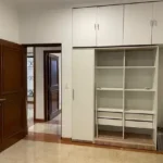 3.5 BHK Windermere Andheri West Bedroom With Open Shelves And Drawers