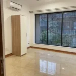 3.5 BHK Windermere Andheri West Bedroom With Wardrobe And Large Window