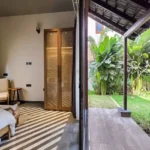 4 BHK Villa Siolim Bardez North Goa Bedroom With Single Chair Near Wooden Wardrobe