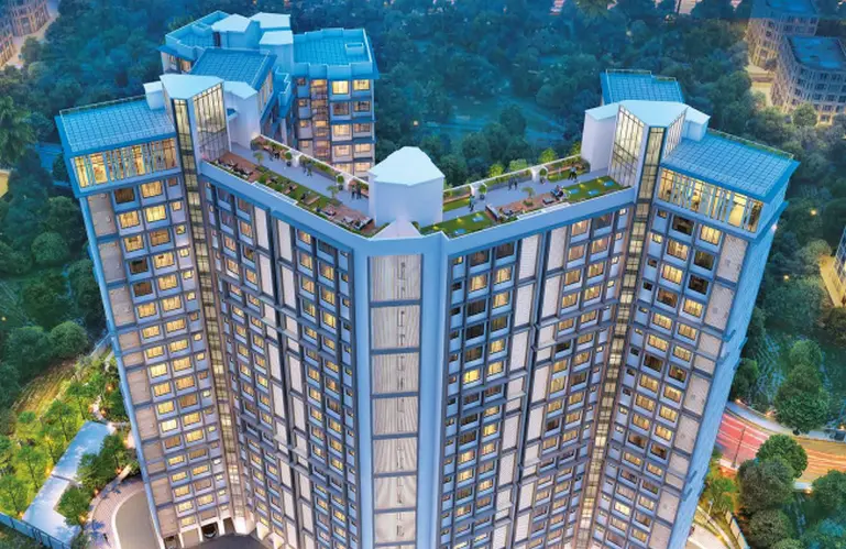 Purva Clermont Chembur Highrise Apartment Building With Rooftop Deck Windows And Surrounding Trees