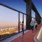 Purva Clermont Chembur Rooftop Running Track With Glass Railing City View Lights And Walking Path