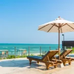 Apartrments Complex in Alibaug Embassy Serenity Terrace with Umbrella deck Chairs