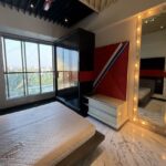4 BHK United Classic Penthouse Duplex Mount Mary Bandstand Bandra Bedroom With Bed And Dressing Mirror