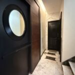 4 BHK United Classic Penthouse Duplex Mount Mary Bandstand Bandra Entry Corridor With Black Door