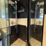 4 BHK United Classic Penthouse Duplex Mount Mary Bandstand Bandra Bathroom With Glass Shower And Mirror