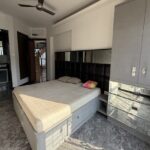 4 BHK United Classic Penthouse Duplex Mount Mary Bandstand Bandra Bedroom With Bed And Wardrobe