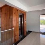 4 Seasons Villas Old Khandala Road Kune Lonavala 5 BHK Villa Elevator Lobby Wooden Cladding Private Lift