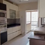 5 BHK Duplex Oberoi Sky Heights Andheri West Kitchen With Cabinets Sink And Countertop