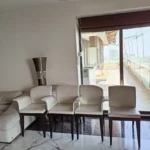 5 BHK Duplex Oberoi Sky Heights Andheri West Living Room With Chairs Near Balcony Doors