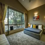 6 BHK Villa Awas Alibaug Bedroom Large Picture Window View