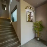 6 BHK Villa Awas Alibaug Staircase Lobby Double Height Wall Artwork
