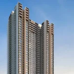 Tall modern residential tower façade with balconies and clean architectural design.