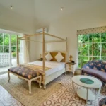 Neel Moira North Goa 5 BHK Elegant Bedroom Suite With Four Poster Bed And Lounge Chairs