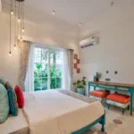 Neel Moira North Goa 5 BHK Modern Bedroom With Colorful Decor And Work Desk