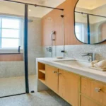 Neel Moira North Goa 5 BHK Modern Bathroom With Glass Shower And Vanity Counter