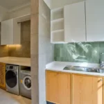 Neel Moira North Goa 5 BHK Utility Laundry Area With Washing Machine And Sink