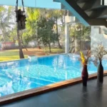 3 BHK Villa In Gondhalpada Alibaug Indoor Pool Facing Lawn And Large Windows