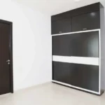 4 BHK Hiranandani Gardens Richmond Tower Powai Dark Panel Wardrobe Fitted Bedroom